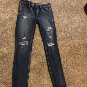 Dark wash ripped denim jeans